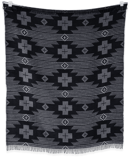 Black fabric with geometric pattern on a plain background
