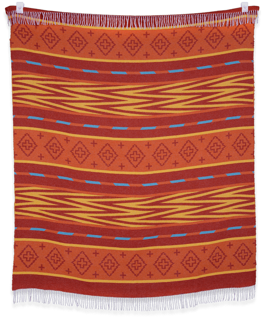 Woven blanket with geometric pattern on a black background