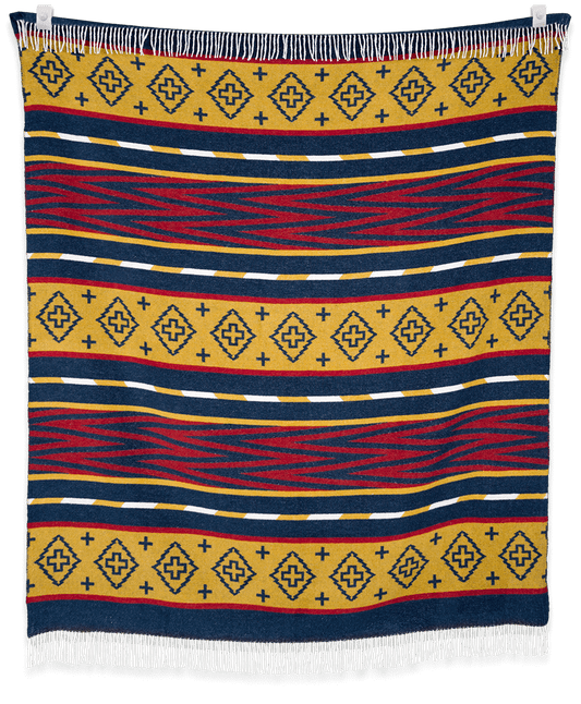 Woven blanket with geometric pattern in red, blue, and yellow on a black background