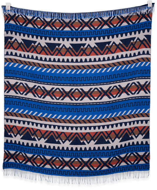 Woven blanket with blue, orange, and white geometric pattern on a black background