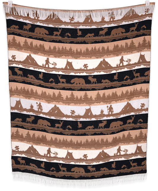 Woven blanket with nature-themed design featuring animals and landscapes.