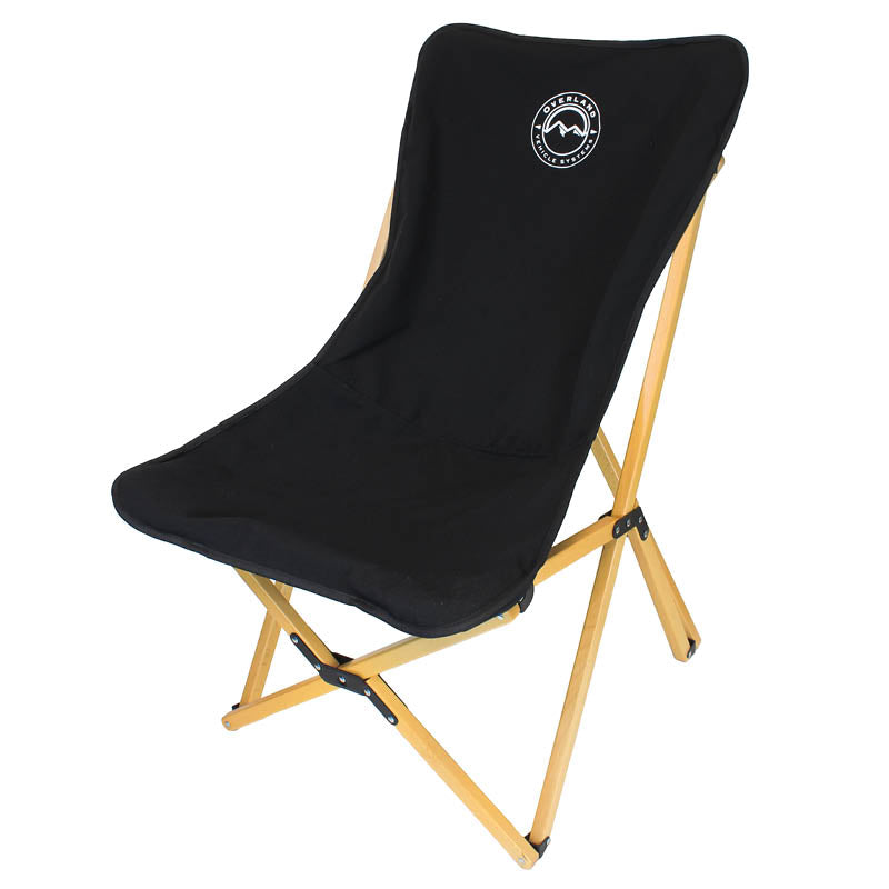Black folding chair with wooden frame on a white background