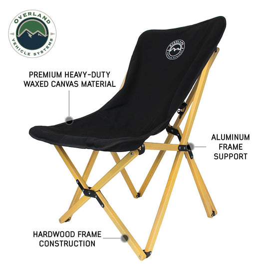 Black camping chair with wooden frame and Overland Vehicle Systems branding on a white background