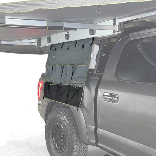 Truck bed organizer attached to a truck bed with a gray background