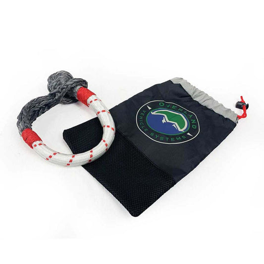 Black drawstring bag with a rope handle featuring Overland Systems logo on a white background