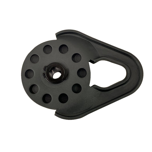 Black metal pulley system on a white background