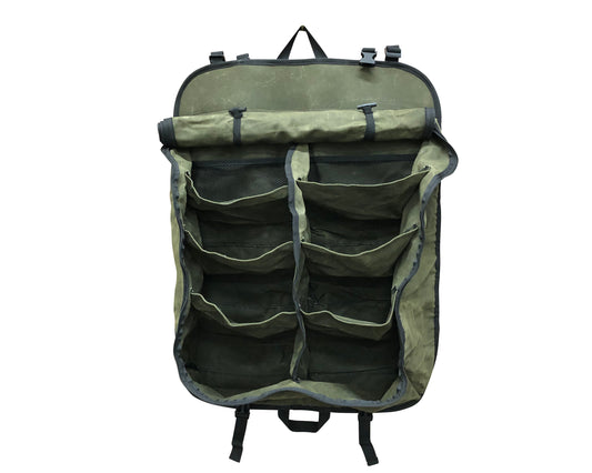 Green  storage bag with multiple pockets on a white background