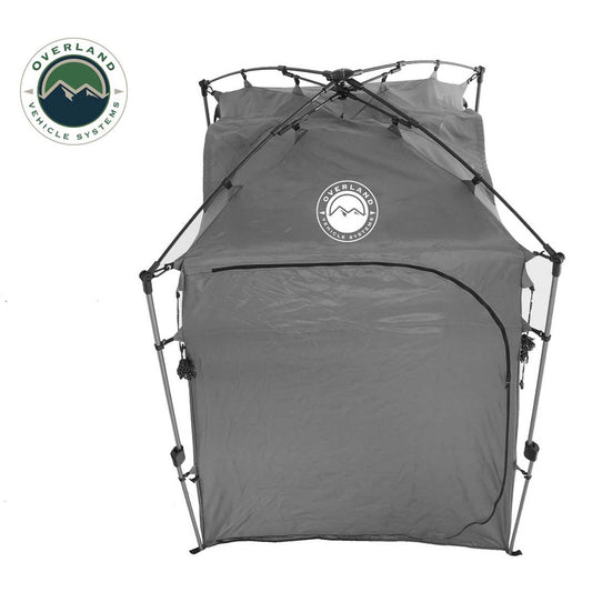Gray camping tent with Overland Vehicle Systems logo on a white background