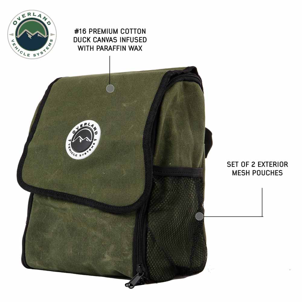 Green overnight bag with black mesh pouches and Overland Vehicle Systems logo on a white background