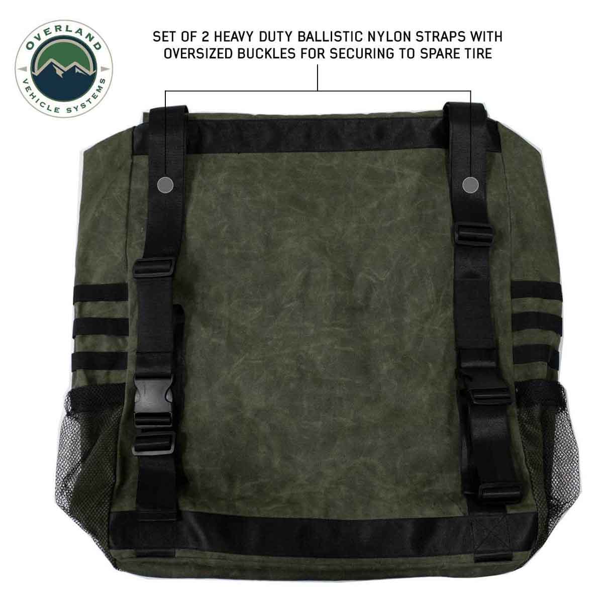 Green roll-top bag with black straps and oversized buckles on a white background, featuring Overland Vehicle Systems logo.