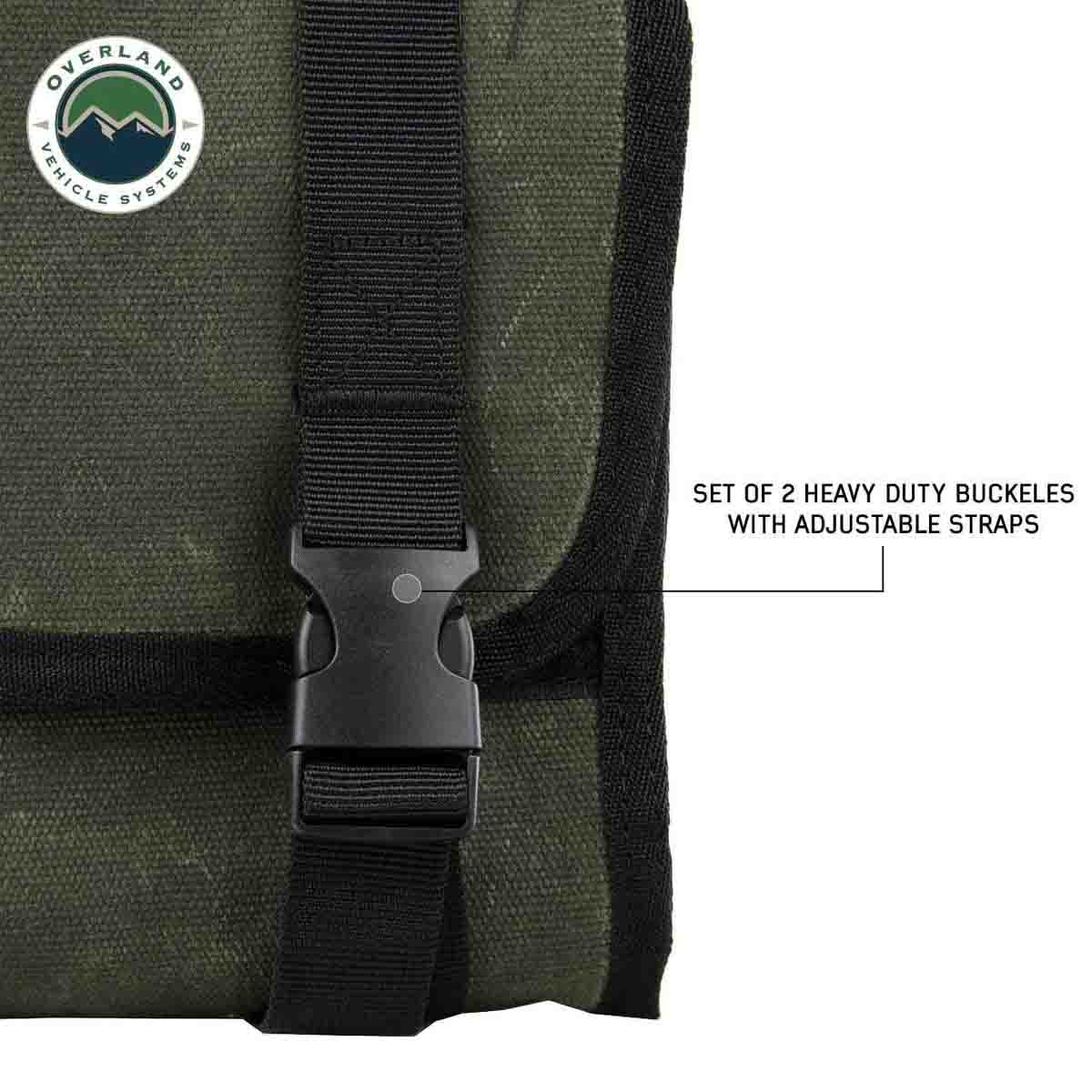 Green bag with black straps and buckles, featuring Overland Vehicle Systems logo.