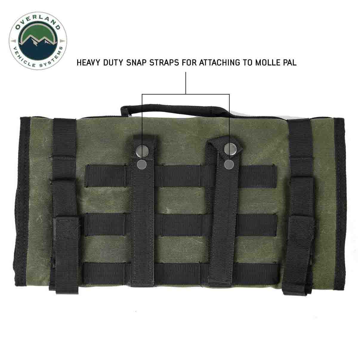 Green roll-up bag with black straps and Overland Vehicle Systems logo.