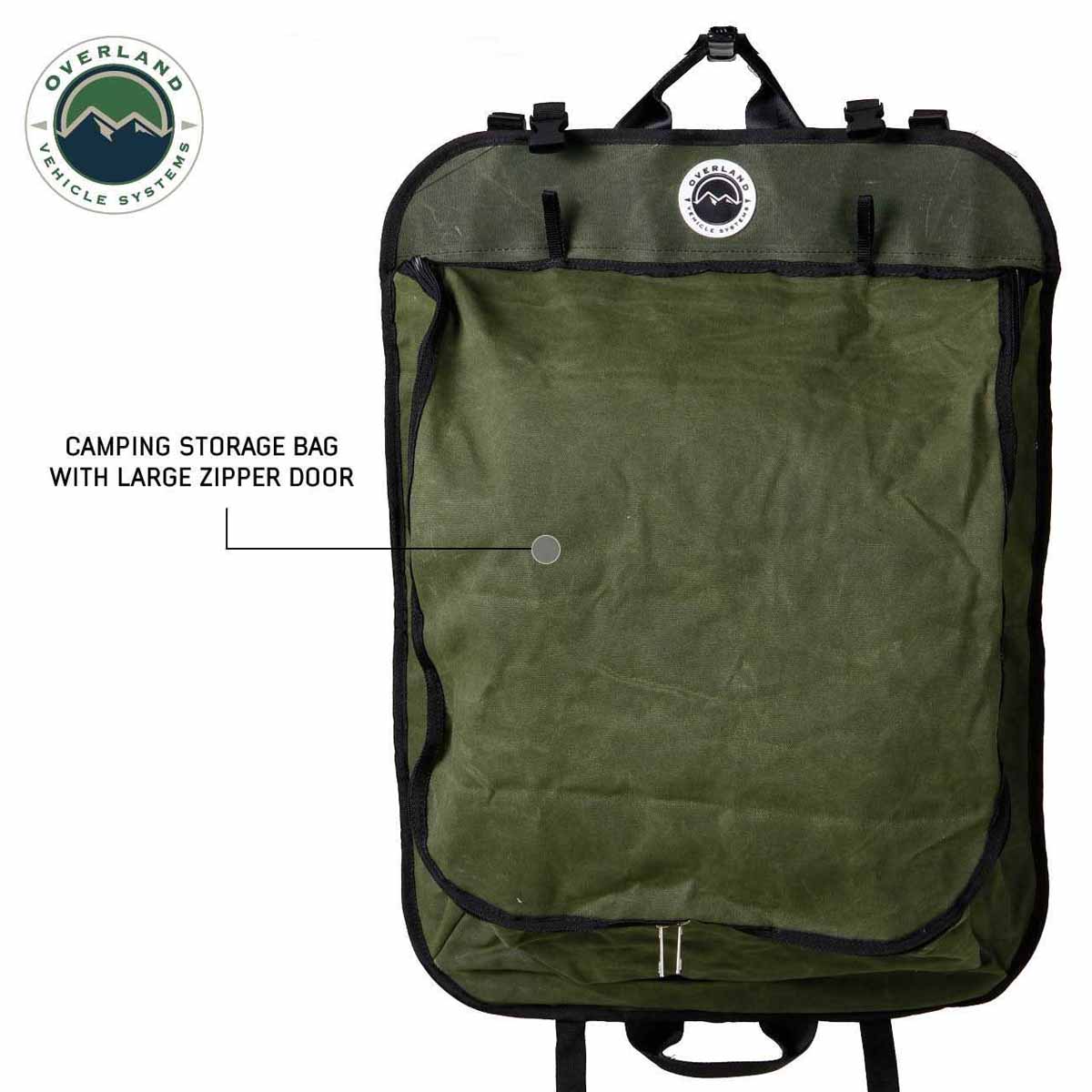 Green camping storage bag with large zipper door on a white background, featuring Overland Vehicle Systems logo.