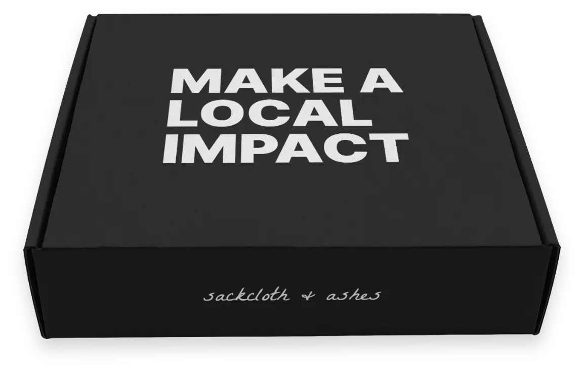 Black box with 'MAKE A LOCAL IMPACT' text and 'sackcloth & ashes' branding.