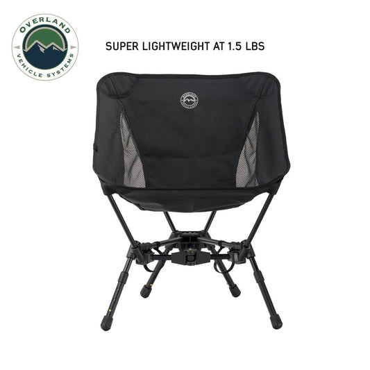 Black camping chair with Overland Vehicle Systems logo on a white background