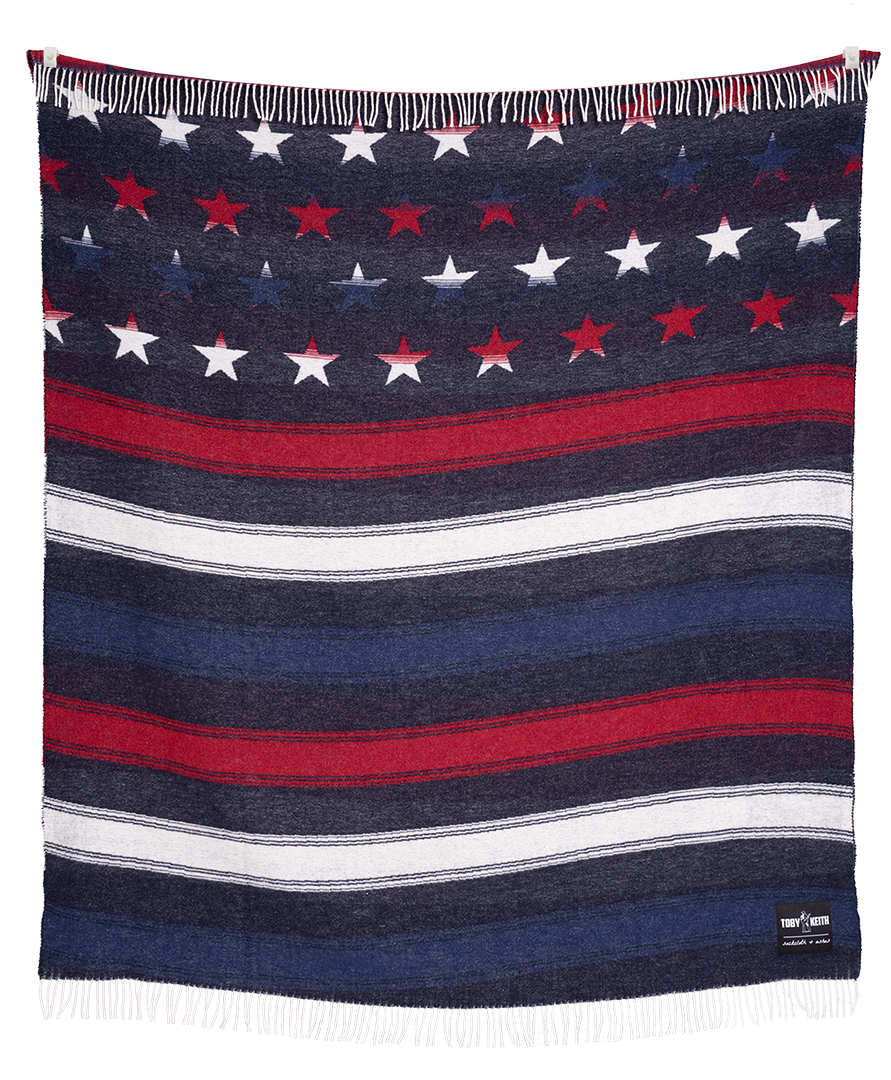 Navy blanket with red, white, and blue stars and stripes pattern