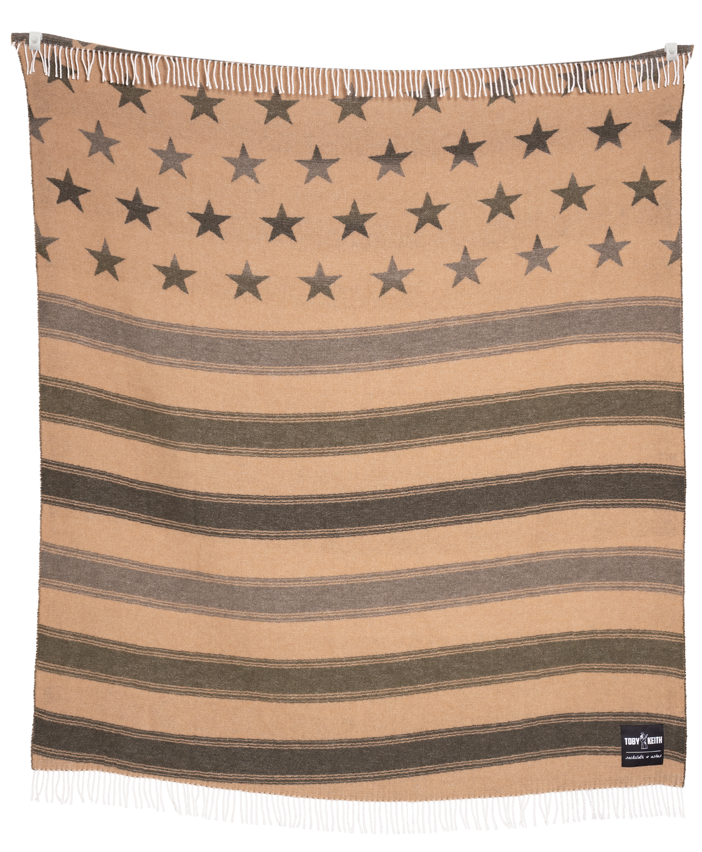 Beige blanket with star pattern and 'Vera Bradley' label