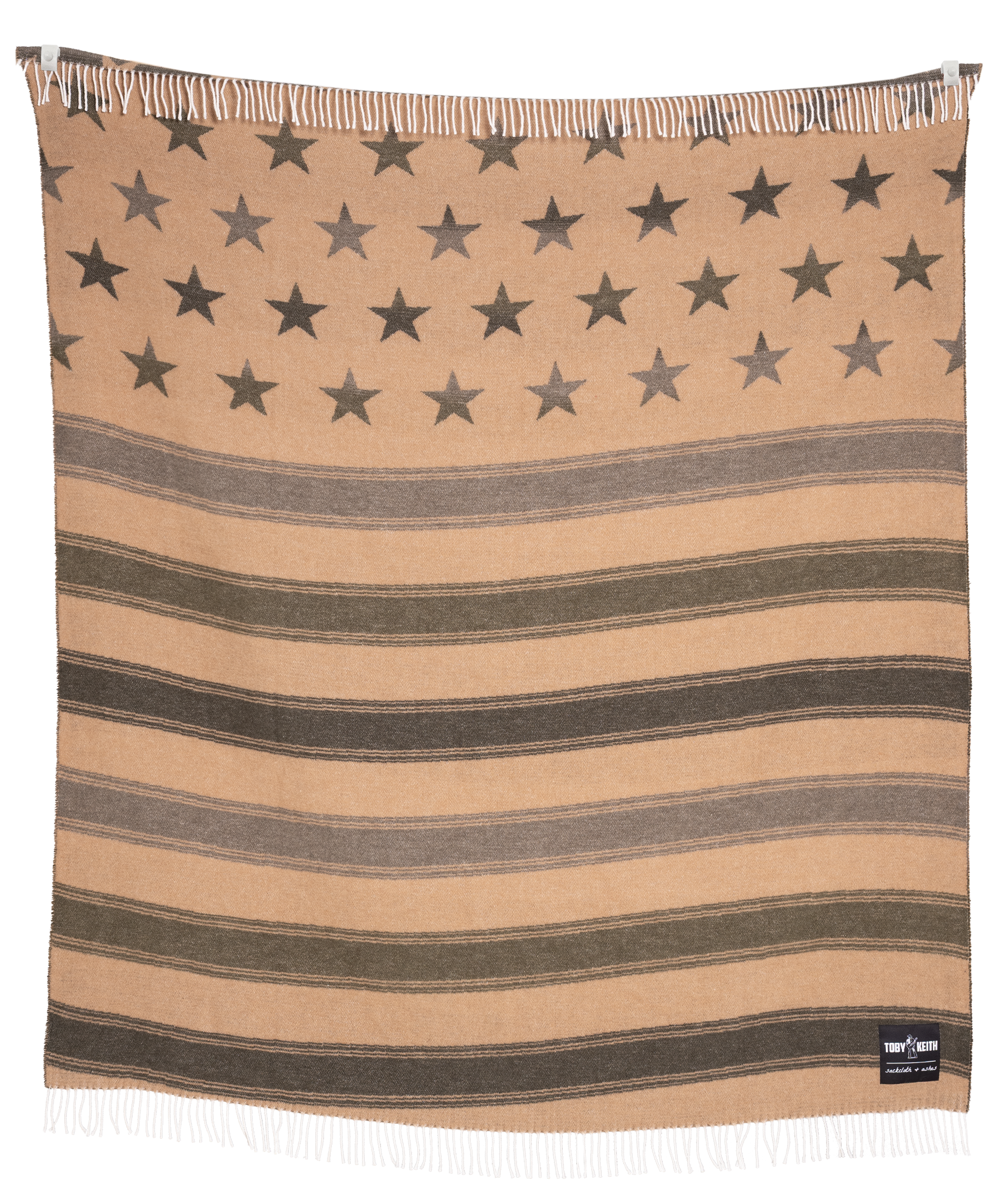 Beige blanket with star pattern and 'Vera Bradley' label