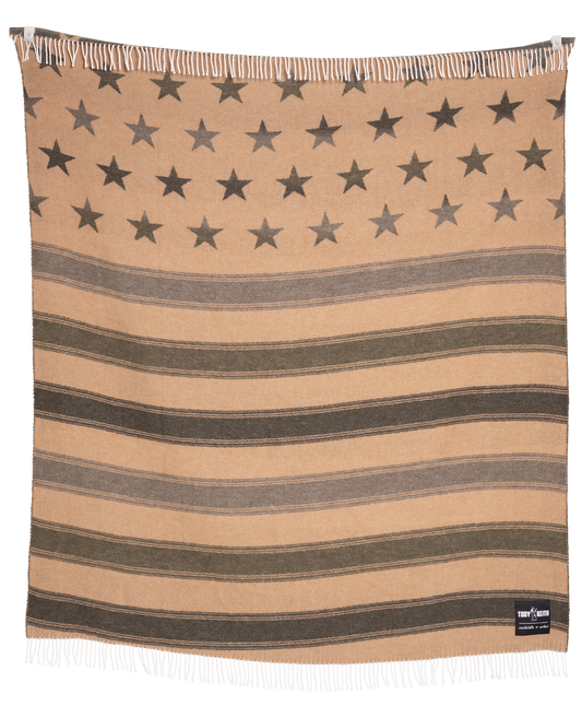 Beige blanket with star pattern and 'Vera Bradley' label