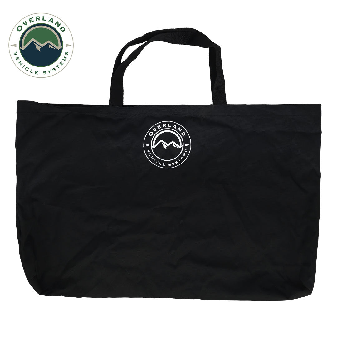 Black tote bag with Overland Vehicle Systems logo on a white background