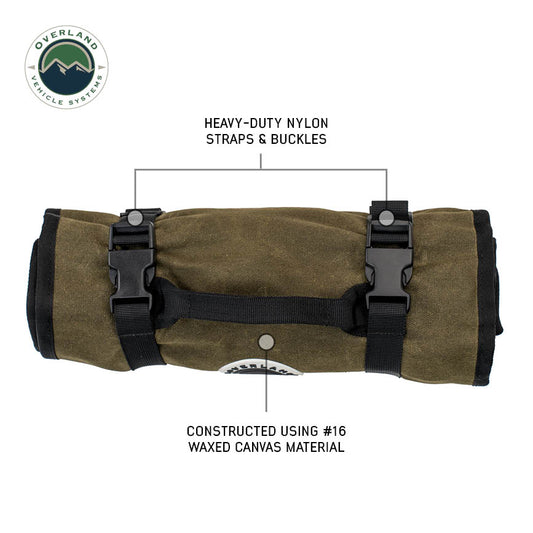 Green roll up bag with black straps and buckles, labeled with material and construction details, on a white background.