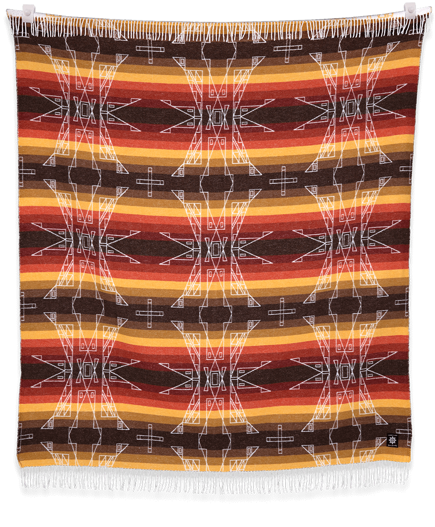 Woven blanket with geometric pattern and colorful stripes on a black background