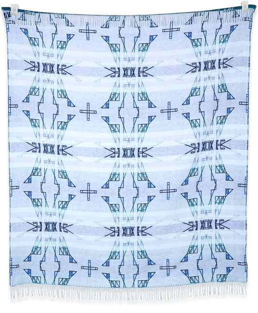 Textile with geometric pattern on a light blue background