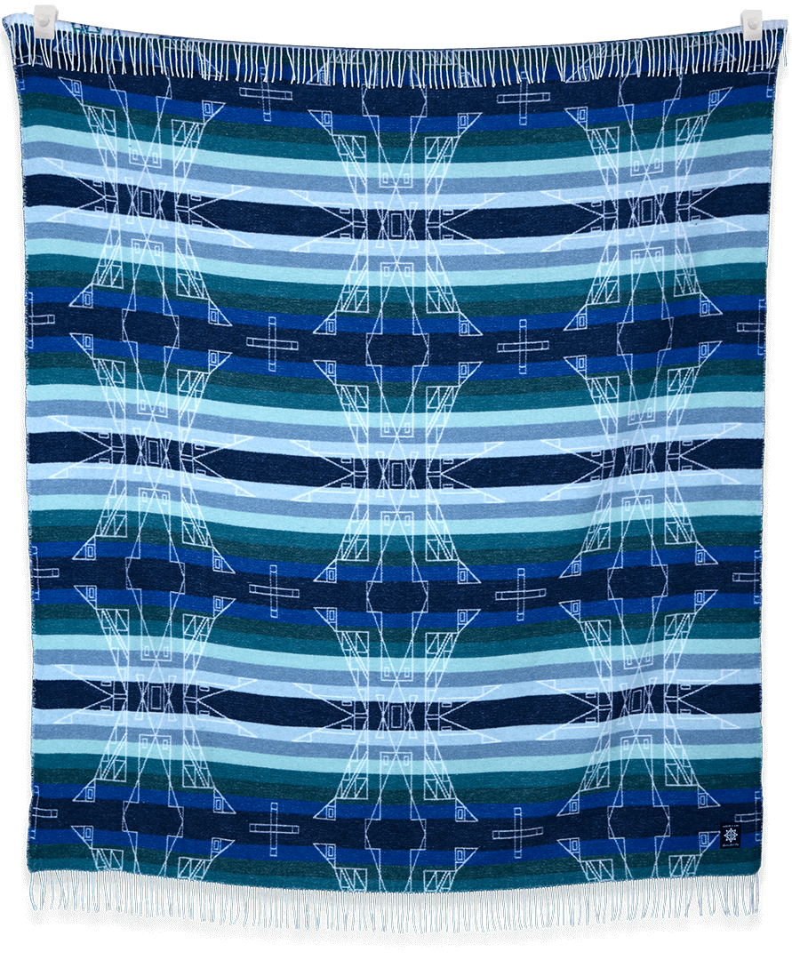 Woven textile with blue and green pattern on a black background