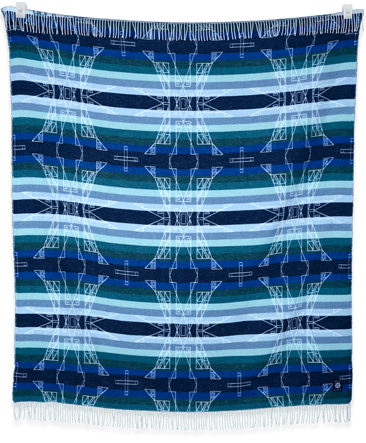 Woven textile with blue and green pattern on a black background