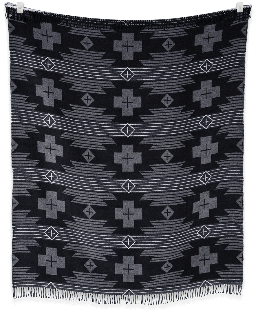 Black fabric with geometric pattern on a plain background