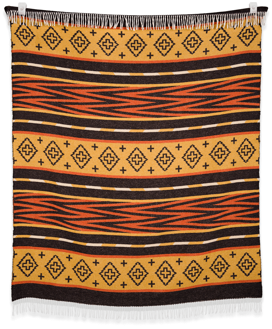 Woven blanket with geometric pattern on a black background