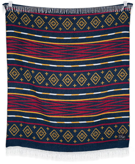 Woven blanket with geometric pattern on a black background