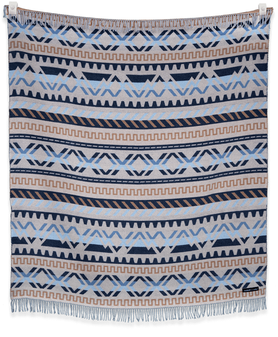 Blanket with geometric pattern on a black background
