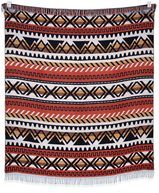 Patterned blanket with geometric design on a black background