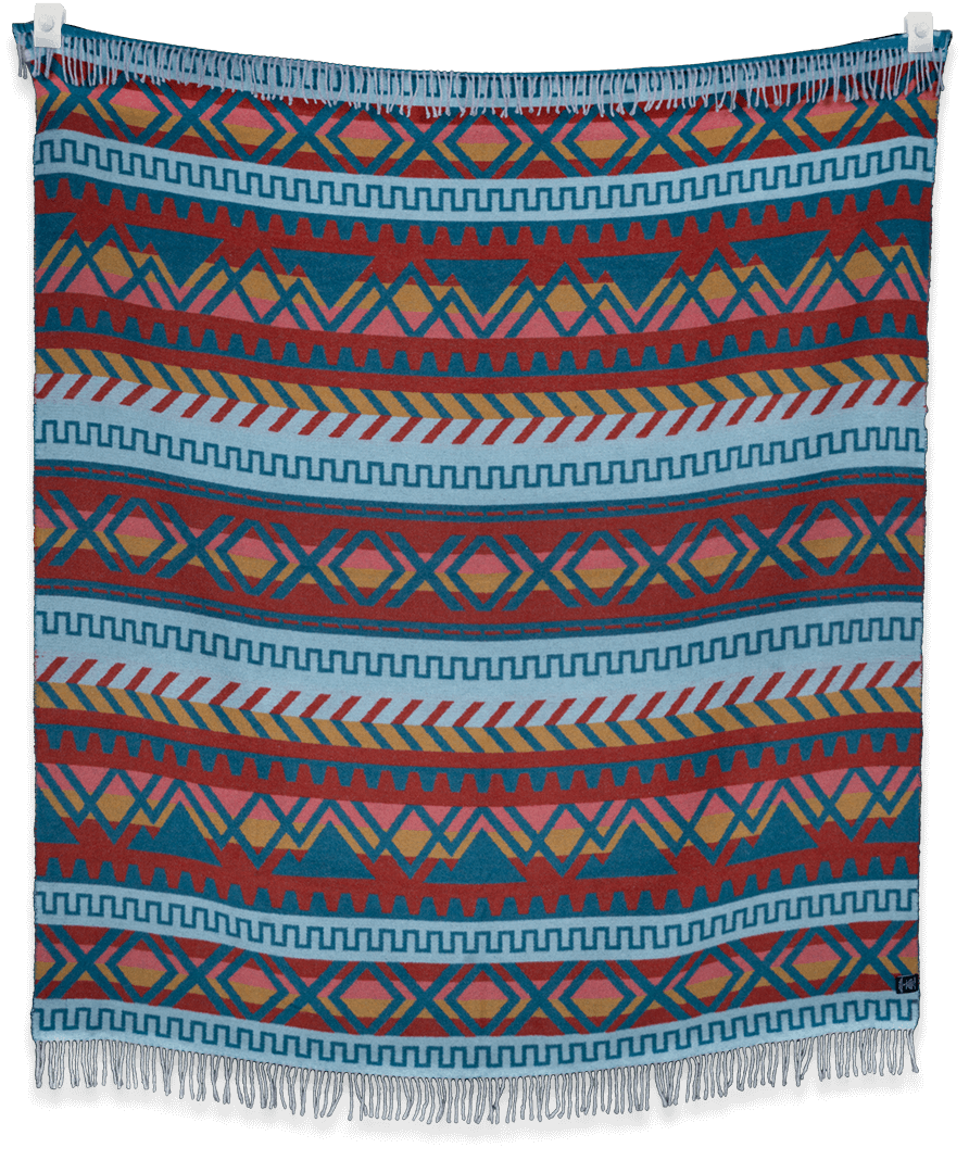 Woven blanket with geometric pattern on a black background