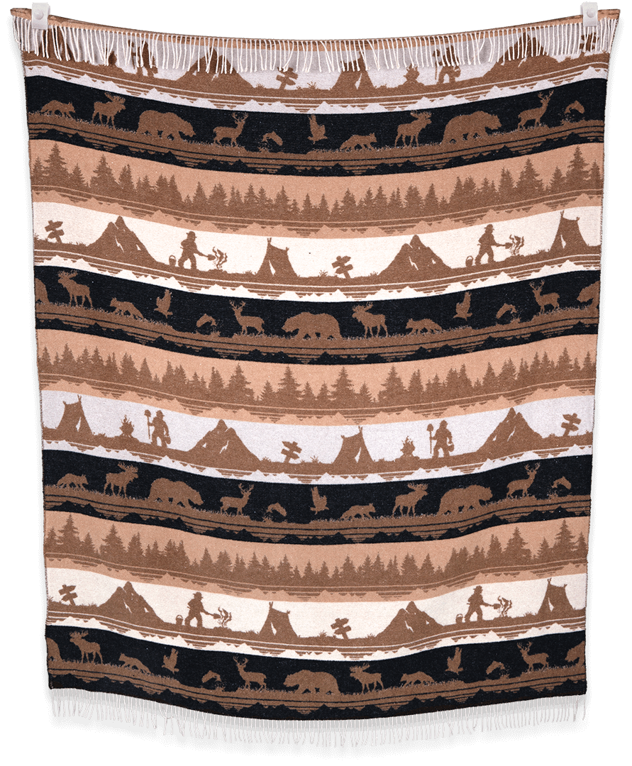 Woven blanket with nature-themed design featuring animals and landscapes.