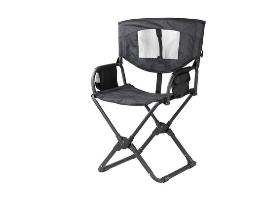 Black folding chair with mesh back on a white background