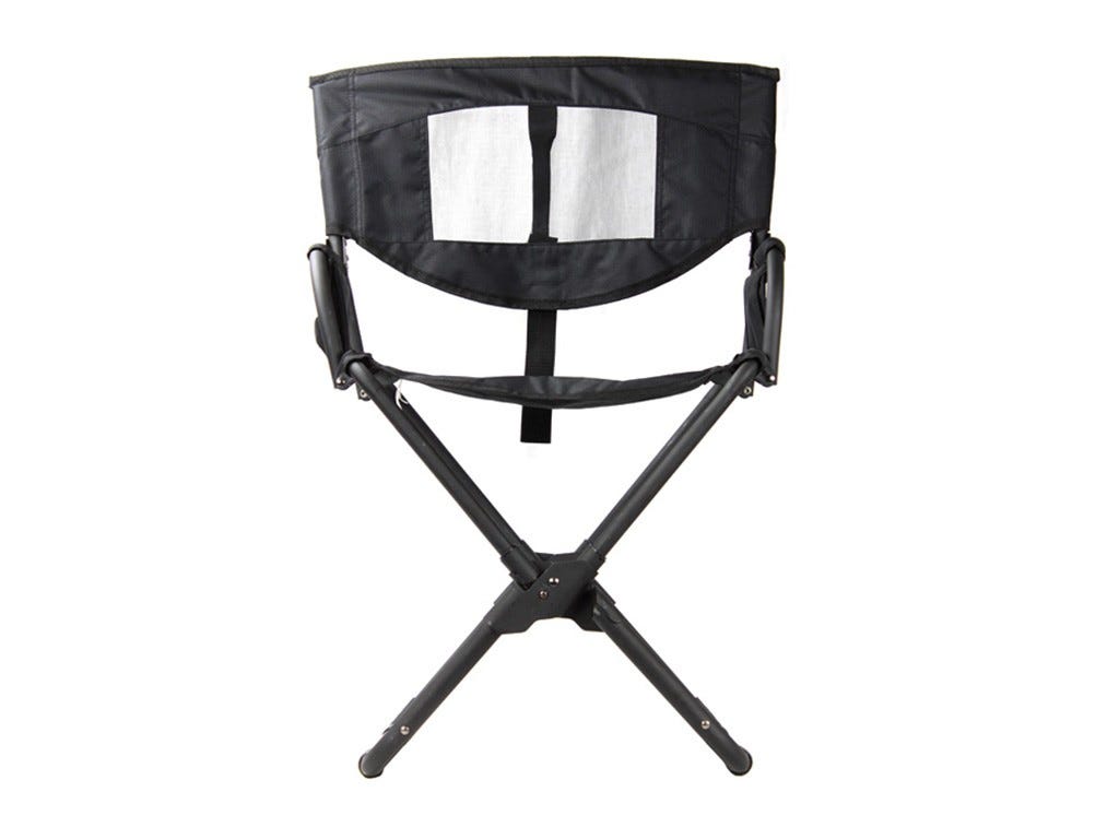 Black folding chair with a white screen on a white background
