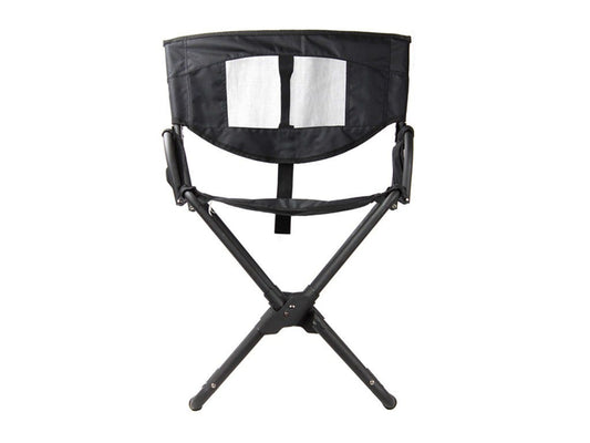 Black folding chair with a white screen on a white background