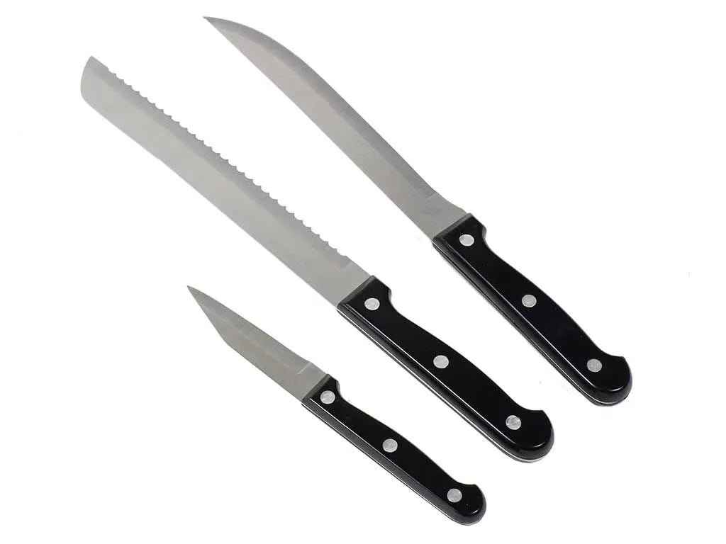Set of four knives with black handles on a white background