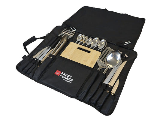 Set of silverware and cutting board in a black carrying case with 'Front Runner' branding.