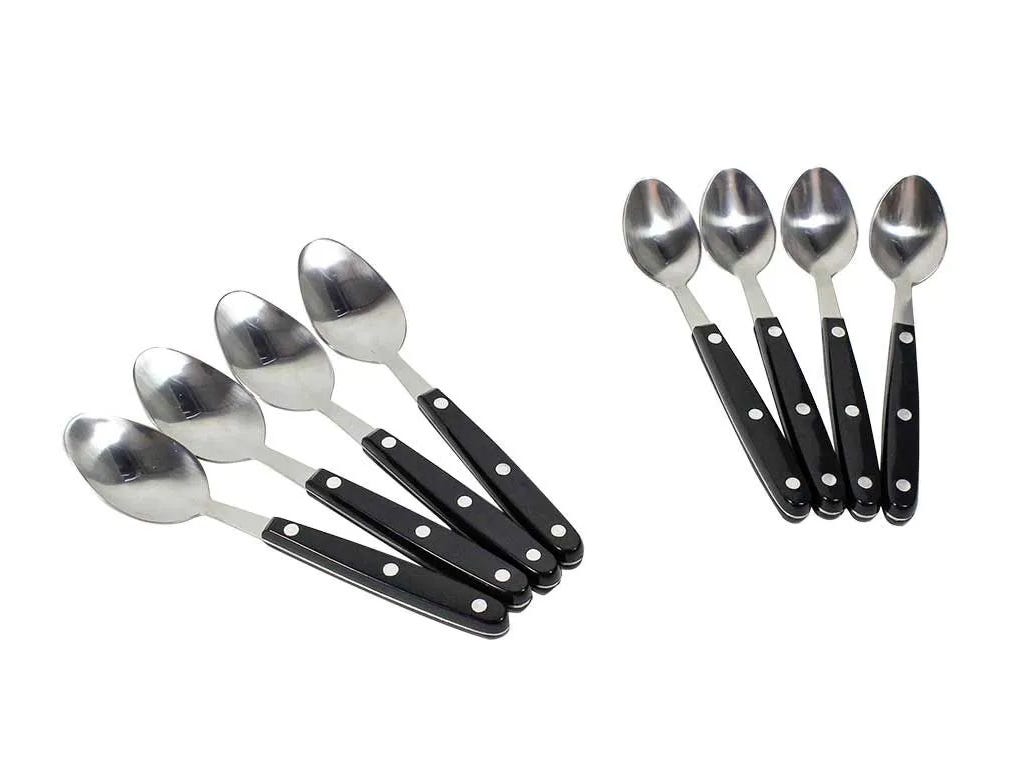 Set of silver spoons with black handles on a white background