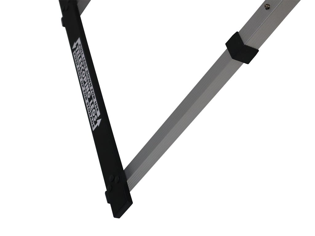 Metal folding stand with black strap on a white background