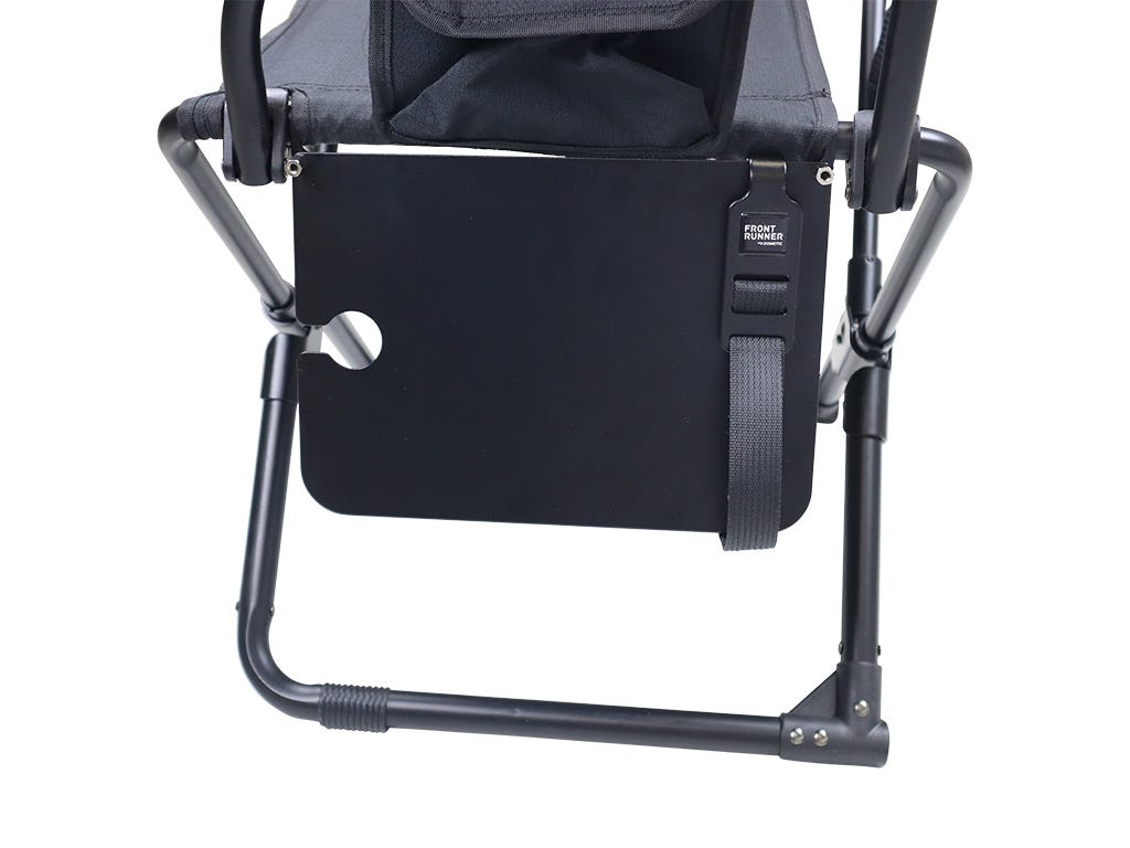 Black camping chair with a seat pad on a white background