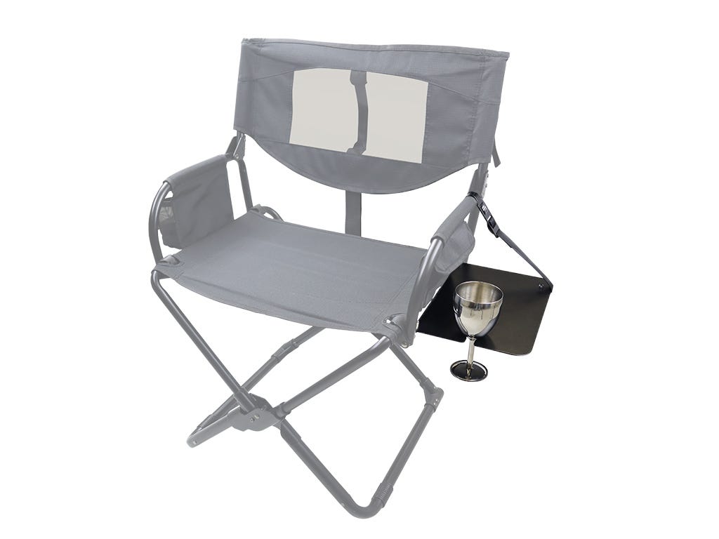 Gray outdoor folding chair with a small table and wine glass on a white background